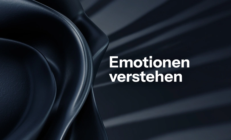 Abstrakte 3D-Skulptur auf dunkelblauem Hintergrund mit dem weißen Schriftzug „Emotionen verstehen". Emotionale Intelligenz